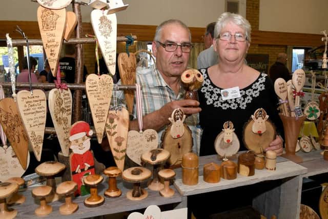 William and Fiona Elkington with their work at the latest Lincolnshire Association of Wood Turners open day at Leasingham Village Hall.