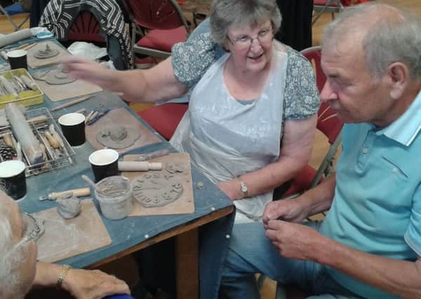 Activities for people with dementia at the Friendship Hub at the NCCD. EMN-181017-125133001