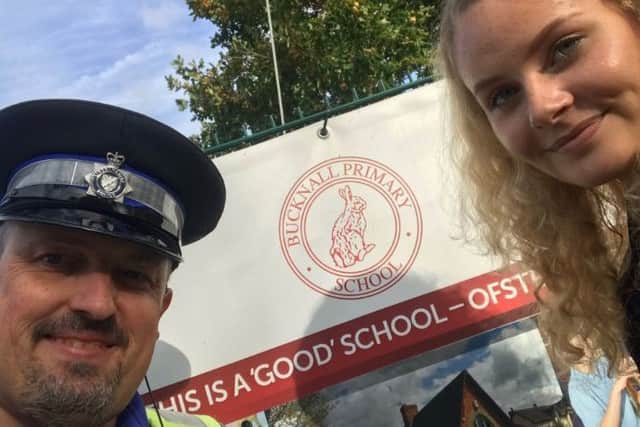 PCSO Nigel Wass with Lincolnshire Police volunteer Tara Loftus. EMN-181018-144555001