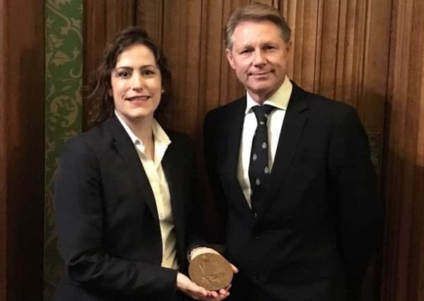 Victoria Atkins MP and David Morris MP with the Great War Memorial Plaque  which is coming 'home' to Spilsby. ANL-181018-091224001