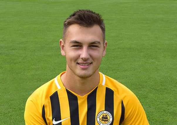 Harrison Holland.