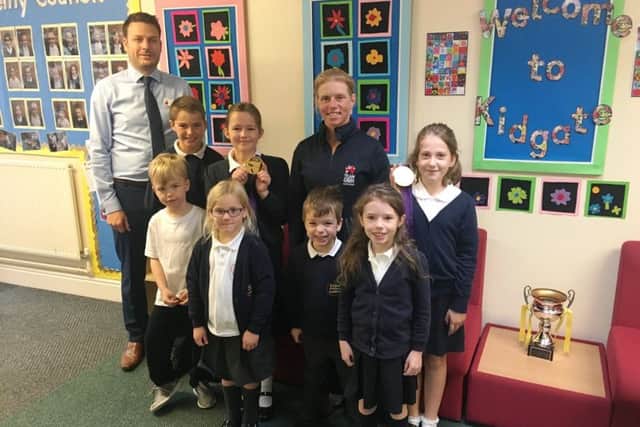 Ros Canter with head teacher, Mr Lidbury, and pupils at Kidgate Primary Academy in Louth last week.