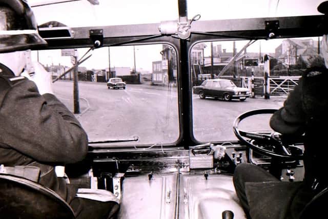 The fire crew at the level crossing between Mareham Lane and Grantham Road in Sleaford back in August 1969. EMN-181029-145620001
