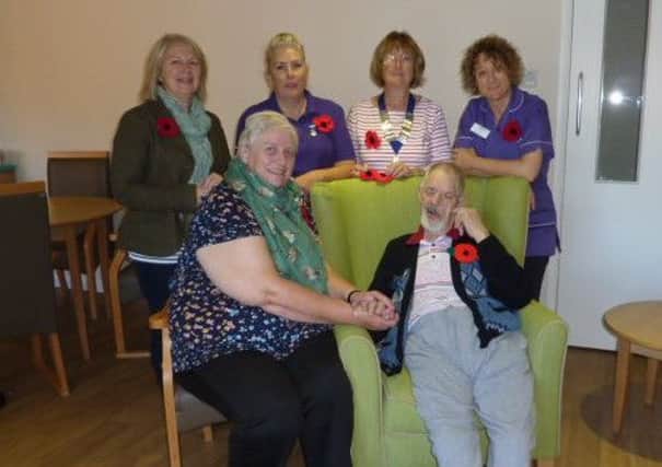 Pictured is Ashfield Lodge Care Home resident Peter Jeffery with visitor Sheila Jeffery and, from left - Lioness Tracy Arnold, Activity Co-ordinator Gill, Lioness President Pam Kyte and activity Co-ordinator Cheryl. EMN-181029-164837001