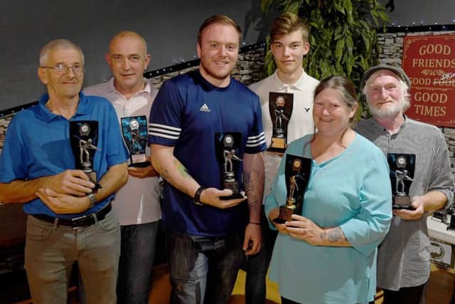 Trophy presentations. L-R Kev Kopp (over 60s winner), Paul Edleston (mens singles runner up), Brian Leggatt (mens singles winner), Jed Humphries (U21s winner), Angi Patterson (laddies singles winner), Bob Dickson (over 60s runner up).
