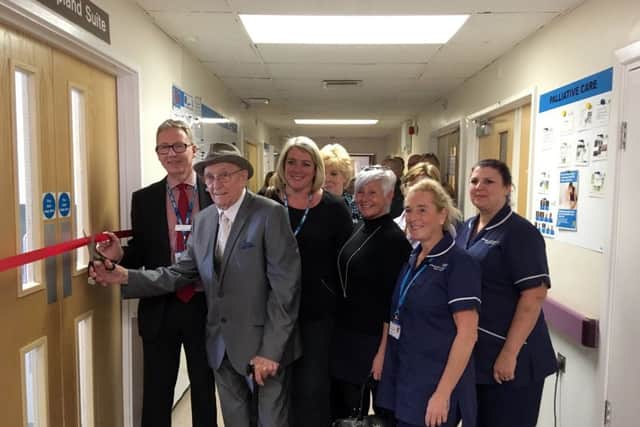 Former patient Fred Powell was asked by staff to cut the ribbon in recognition of his contributions to fundraising and ongoing support to the ward. EMN-181022-101238001