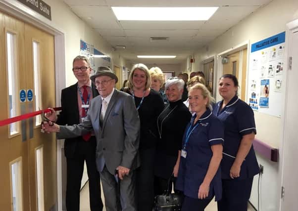 Former patient Fred Powell was asked by staff to cut the ribbon in recognition of his contributions to fundraising and ongoing support to the ward. EMN-181022-101238001