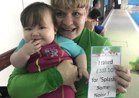 Young fundraiser Jaina Swannack with teacher Zoe Fretwell.