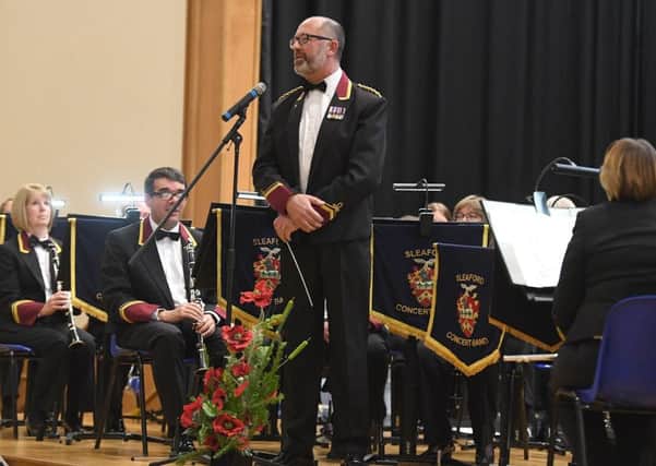 Royal British Legion poppy prom with Sleaford Concert Band. Director of Music Richard Joyce. EMN-181023-110453001