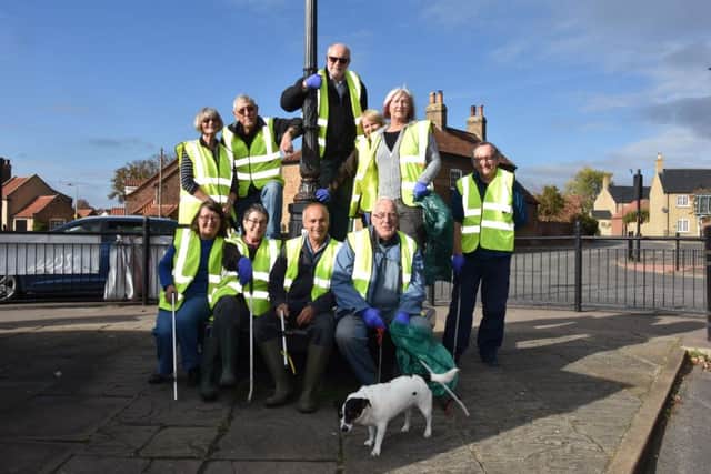 Members and friends of Wragby Heritage Group who completed a successful litter pick. Photo by John Edwards EMN-181023-132334001