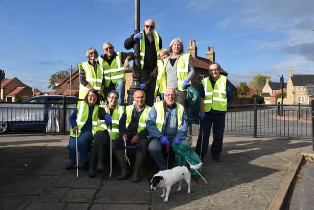 Members and friends of Wragby Heritage Group who completed a successful litter pick. Photo by John Edwards EMN-181023-132334001