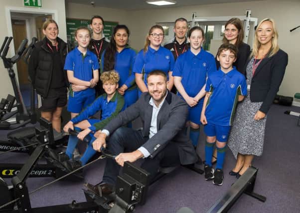 Ben Cohen meets students and staff in the Fitness Suite at Somercotes Academy. Photo: Sean Spencer.