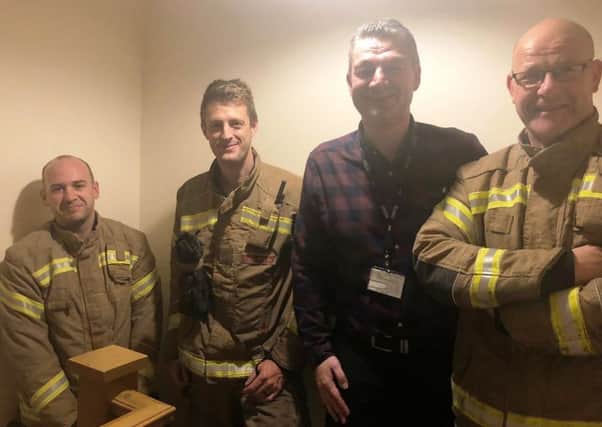 BBC Radio Lincolnshire presenter pictured shortly after he was rescued from his bedroom by Boston fire-fighters. Images supplied.