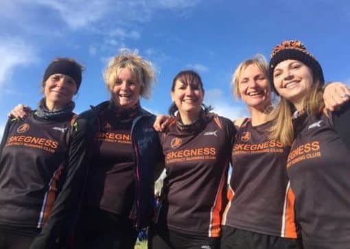 The women's cross country team. bNxL7hkpPYX76NzkDY1o