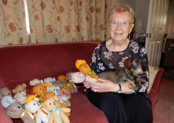 Gill Goulder, of Kirton, with some of the bears she has knitted for this year's shoe box appeal.