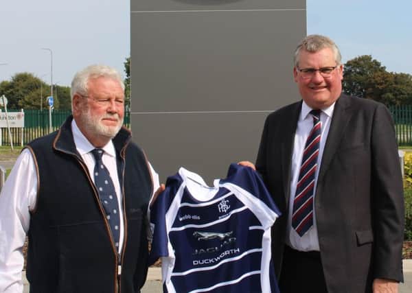 Boston Rugby Club's Brian Stephens, left, is pictured presenting a shirt to Andrew Shaw of Duckworth Jaguar, the club's main sponsor.