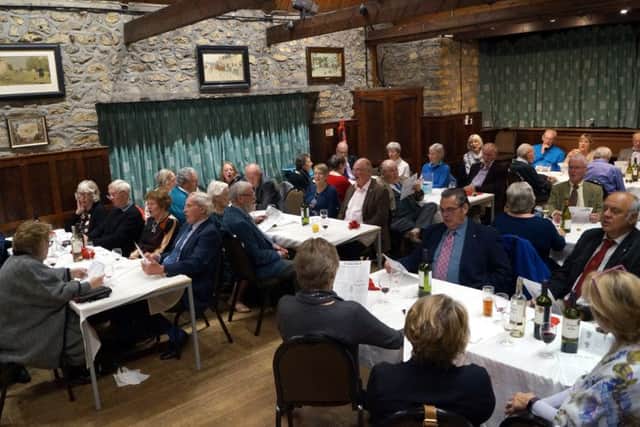 Rotarians and their guests packed into Tealby Village Hall.