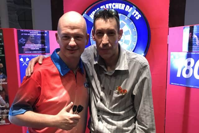 Professional darts player Jamie Caven (left) was also among those at the event.