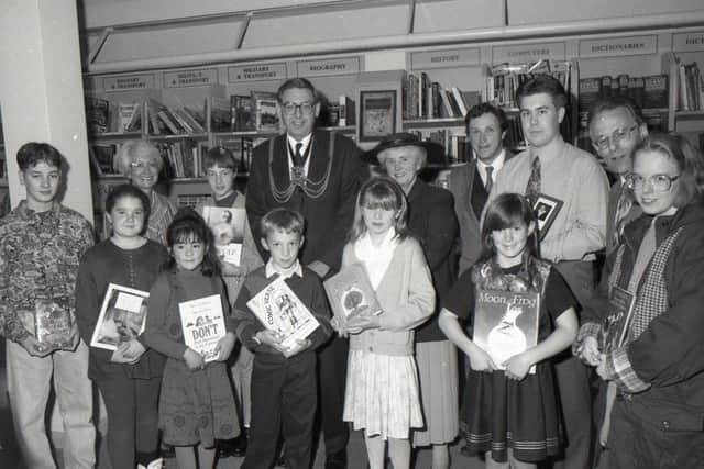 This group of 10 youngsters had impressed in a poetry competition 25 years ago and are pictured collecting their prizes at Oldrids book department from Mayor of Boston Coun Keith Dobson.