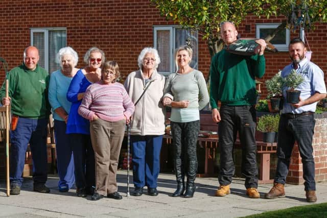PeterDyer Court residents Joan Millington, Kath Wright, Kathy King and Amelia Elson, pictured withJanet Allinson, Matt Parsey and Chris Heath and Nick Royston.