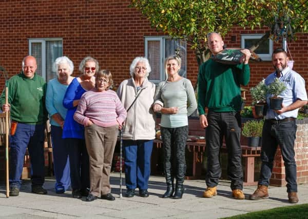 PeterDyer Court residents Joan Millington, Kath Wright, Kathy King and Amelia Elson, pictured withJanet Allinson, Matt Parsey and Chris Heath and Nick Royston.