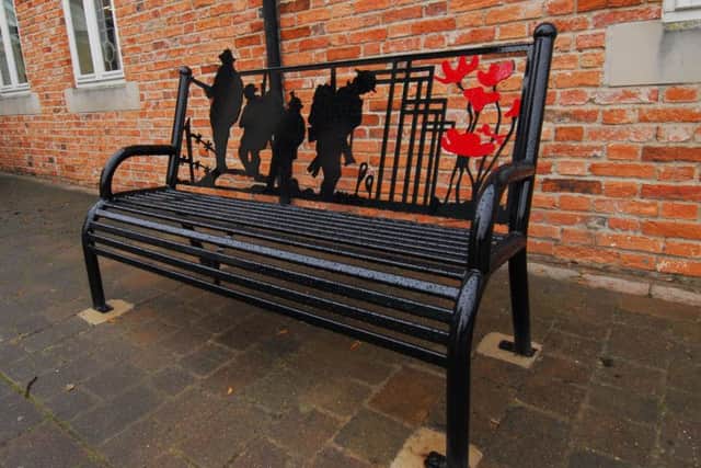 The commemorative poppy bench outside Sleaford Town hall. EMN-180611-113942001