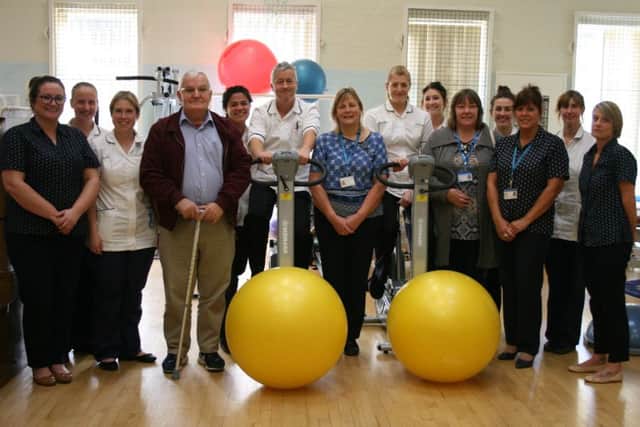 Some of Lincolnshire's physiotherapy members of staff, alongside patient George Klein (fourth from left) and patient Sue Bole (fifth from right).