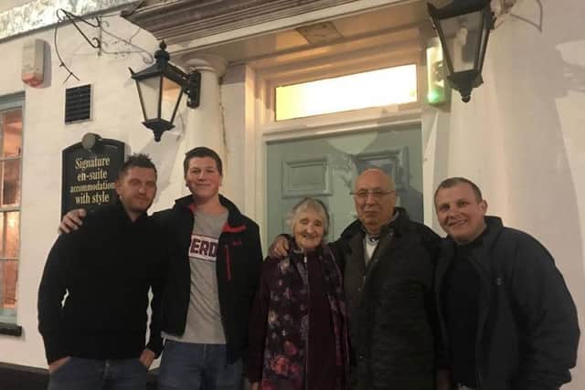 Locals eagerly awaiting the re-opening of the White Hart hotel in Spilsby. ANL-180311-130537001