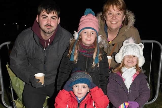 Jack Buttery and Mark Cottingham with Mia Water (7), Dylan Taylor (2), and Ella Eaglen (3) of Market Rasen. Photo: David Dawson.