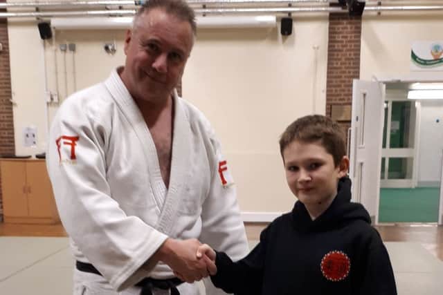 Charlie Webb with Sensei Mark Mason.