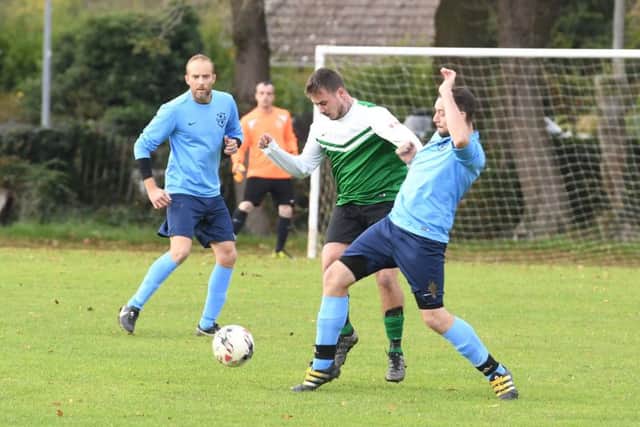 Friskney (blue) v Pointon Res (green). Chris Harker (blue), Joesph Pell (green)