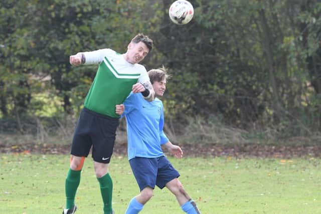 Friskney (blue) v Pointon Res (green). Ryan Appleton (blue), Sam Elliff (green)