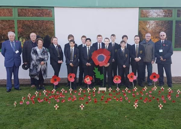 members of the Horncastle War Memorial Committee with Banovallum pupils