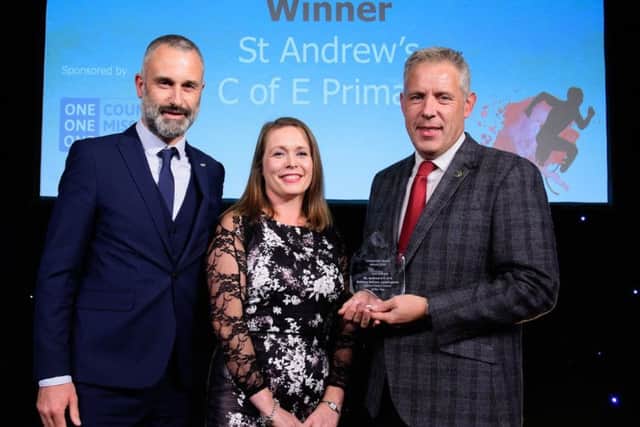 Vincent Brittain from sponsors One Network presents the Active Primary School of the Year award to Leasingham St Andrews,
Picture: Chris Vaughan Photography EMN-180511-160624002