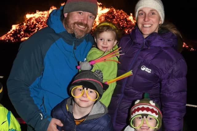 Sleaford Rugby Club firework display. Pete and Sam Olliver with Matthew Olliver 7, Jessica Olliver 1, Jason Olliver 4. EMN-180511-110706001