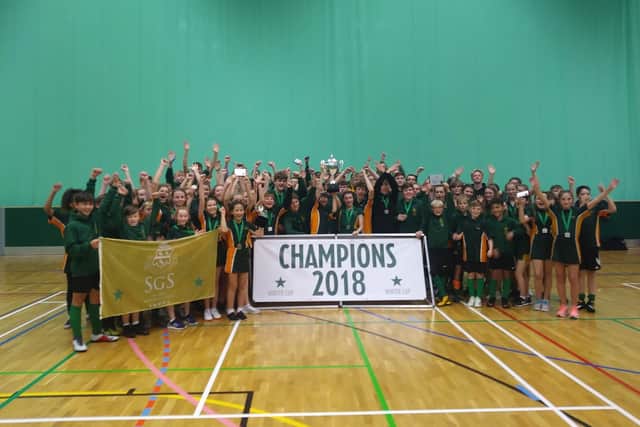 Skegness Grammar School Winter Cup champions celebrate their success.