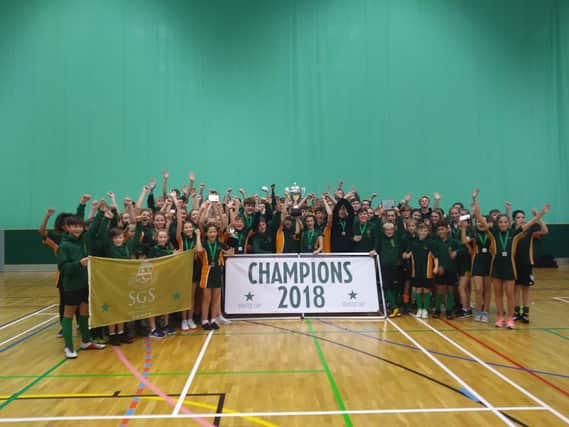Skegness Grammar School Winter Cup champions celebrate their success.