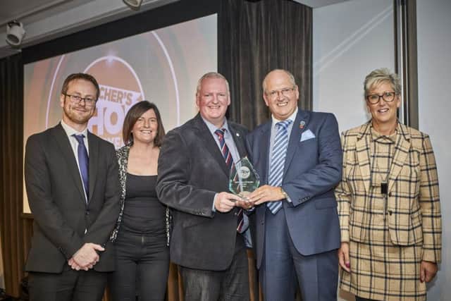 Meat Trades Journals Aidan Fortune with Carmen Kirk, John Kirk, Andrew Kirk and Maureen Kirk of Kirks Butchers.