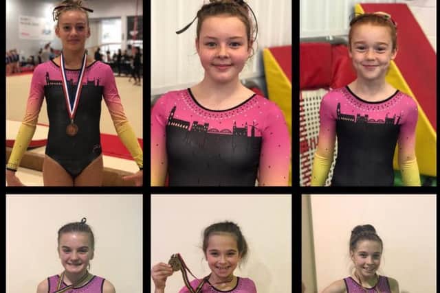 The six gymnasts.