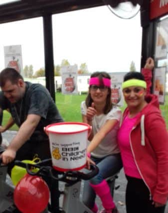 Bucket ready for donations for Children in Need. ANL-180811-151109001