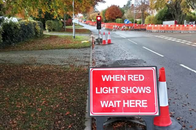 Seeing red: Temporary traffic lights are back on Langton Hill in Horncastle - just days after being removed. Photo: John Fieldhouse