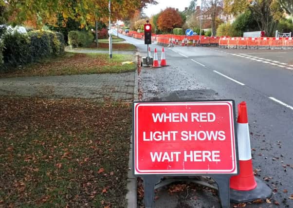 Seeing red: Temporary traffic lights are back on Langton Hill in Horncastle - just days after being removed. Photo:  John Fieldhouse