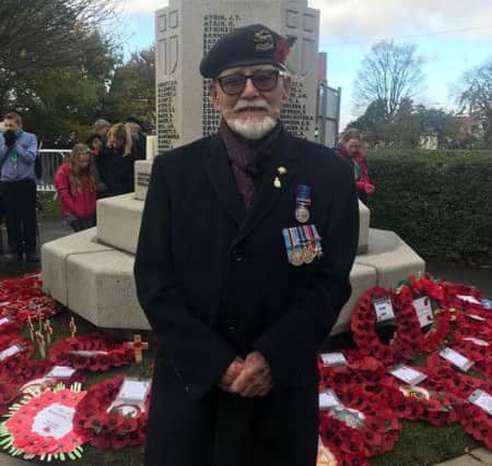 Veteran Cliff Newton by the Memorial in Skegness. ANL-181111-162324001