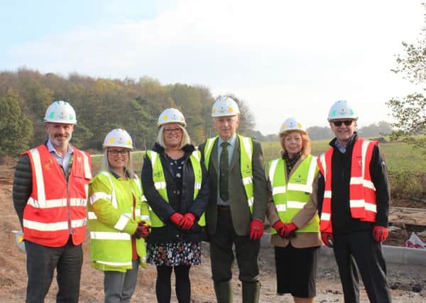 Left to right: Adrian Coleman (of Willmott Dixon, contractors), Marie Jackson (Capital Projects Officer), Karen Whitfield (Communities and Commercial Manager), Coun Jeff Summers (Leader of WLDC), Coun Jessie Milne (Lea Ward), David Reid (of Willmott Dixon) EMN-181211-123514001