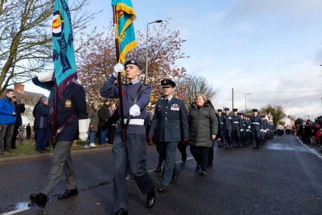 The parade marches down the main high street of Coningsby