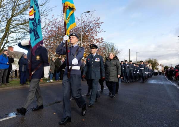 The parade marches down the main high street of Coningsby
