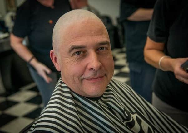 Jonathan Hoare pictured after his hair was shaved off for Macmillan Cancer Support. Images supplied.