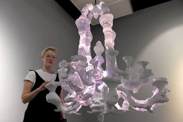 Festival of Glass at National Centre for Craft and Design. Artist Erin Dickson of Sunderland with her artwork, Authentic Venetian Chandelier. EMN-181211-105004001
