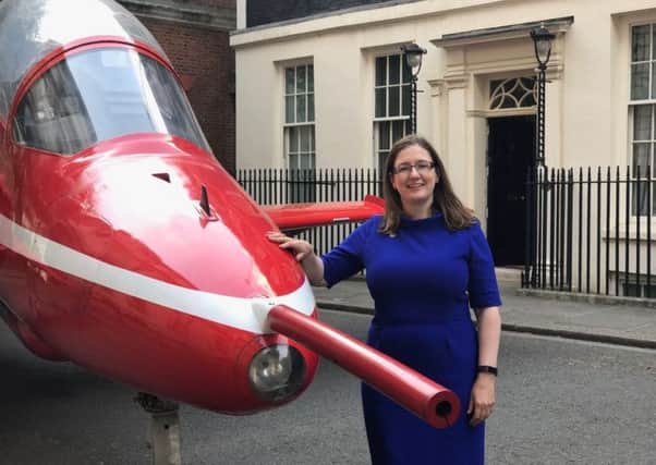 Sleaford and North Hykeham Mp Dr Caroline Johnson with a Red Arrow at No.10 Downing Street. Images supplied.