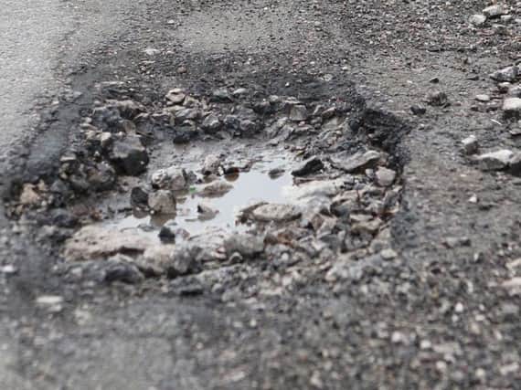 County cash for potholes